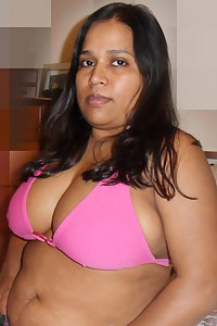 Young Indian gf on beach taking her bikini off