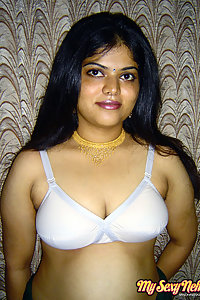 Gorgeous Neha Nair in white bra giving seductive poses
