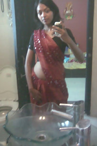 Indian babe in shower posing