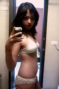Indian babe in shower posing