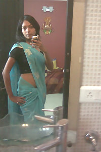 Indian babe in shower posing