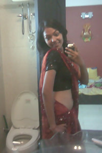 Indian babe in shower posing