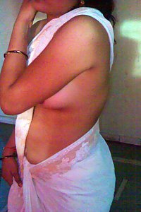 Indian wife in wet saree getting horny