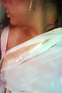 Indian wife in wet saree getting horny