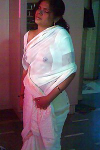 Indian wife in wet saree getting horny