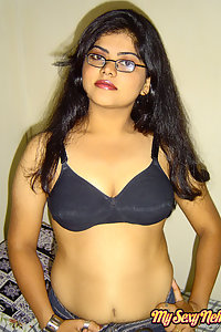 Sexy neha nair in bedroom showing her assets off