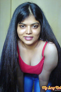 Indian Wife Neha in her bedroom showing her juicy boobs