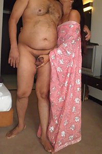 Young Indian couple getting naught in bedroom after party