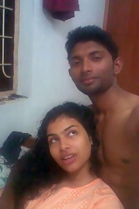 newly married Indian wife with her hubby naked in bed