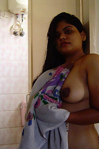 Indian Wife Neha in shower soaping her boobs teasing her hubby