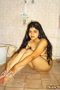 Indian Wife Neha in shower soaping her boobs teasing her hubby