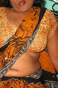 Mature Indian housewife stripping off