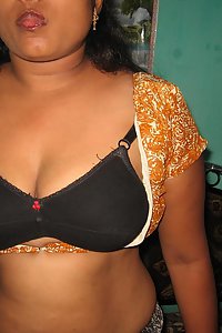 Mature Indian housewife stripping off