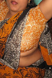 Mature Indian housewife stripping off