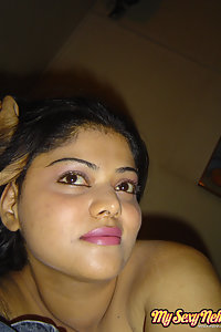 Indian Wife Neha showing off her big boobs in yellow camisole