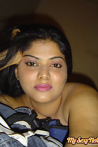 Indian Wife Neha showing off her big boobs in yellow camisole