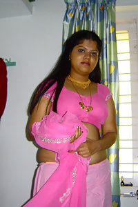 Delicious Neha stripping her pink saree off showing pussy