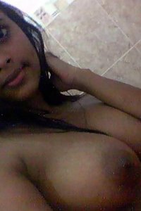 skinny Indian girl laying naked in bed with her bf