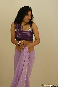 Kavya in favoruite sari getting ready for party