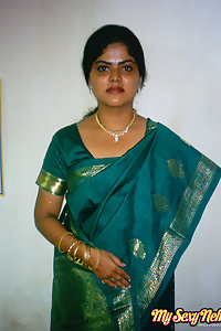 Indian Wife Neha in traditional green saree stripping naked