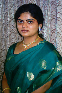 Indian Wife Neha in traditional green saree stripping naked