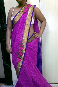 Indian homemaker stripping her traditional Indian outfits