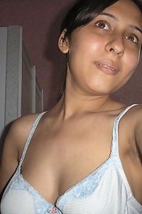 Young sexy Indian stripping naked