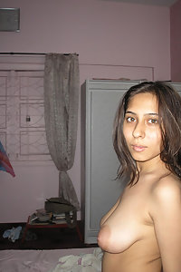 Young sexy Indian stripping naked