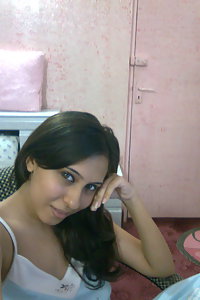 Hot Indian girl posing in bedroom