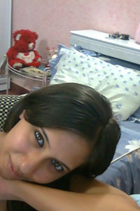 Hot Indian girl posing in bedroom