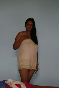 india girl after shower unwrapping her towel