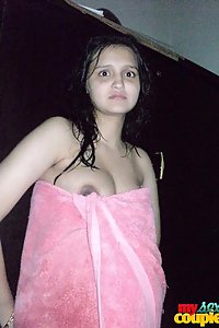 Sonia after shower in towel with sunny