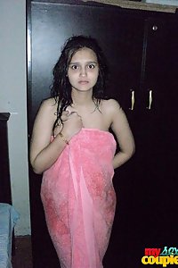 Sonia after shower in towel with sunny