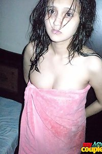 Sonia after shower in towel with sunny