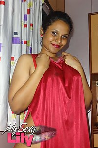 Horny Lily in red sexy nighty looking hot stripping naked to tease